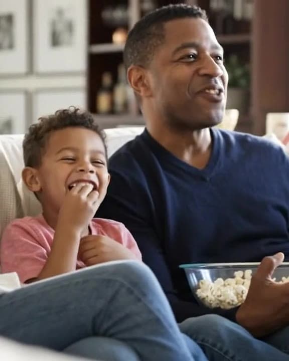 A family gathered together for movie night